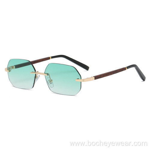 New European and American fashion frameless polygon Sunglasses Women's gradually changing color Sunglasses trend wood grain leg